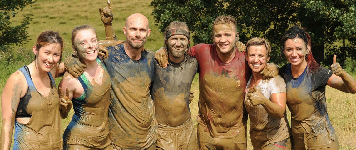 Doncasters Bramah staff and friends taking part in Tough Mudder in 2018
